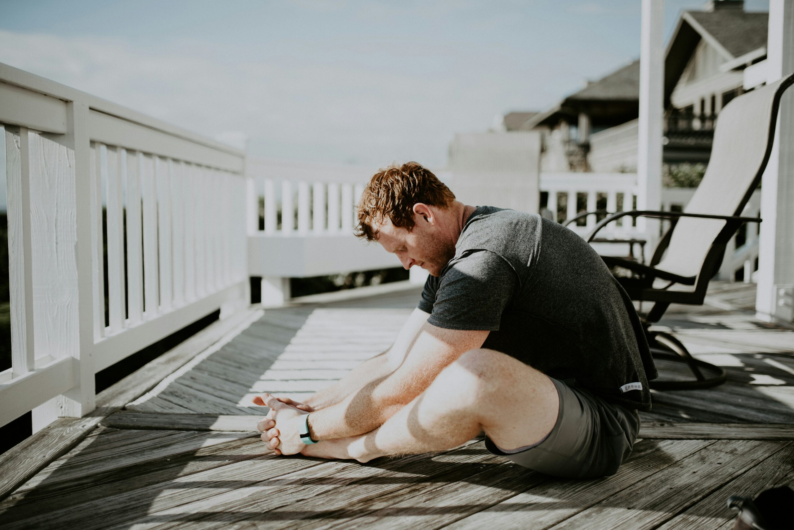 Runner stretching outdoors during a post-run recovery cooldown